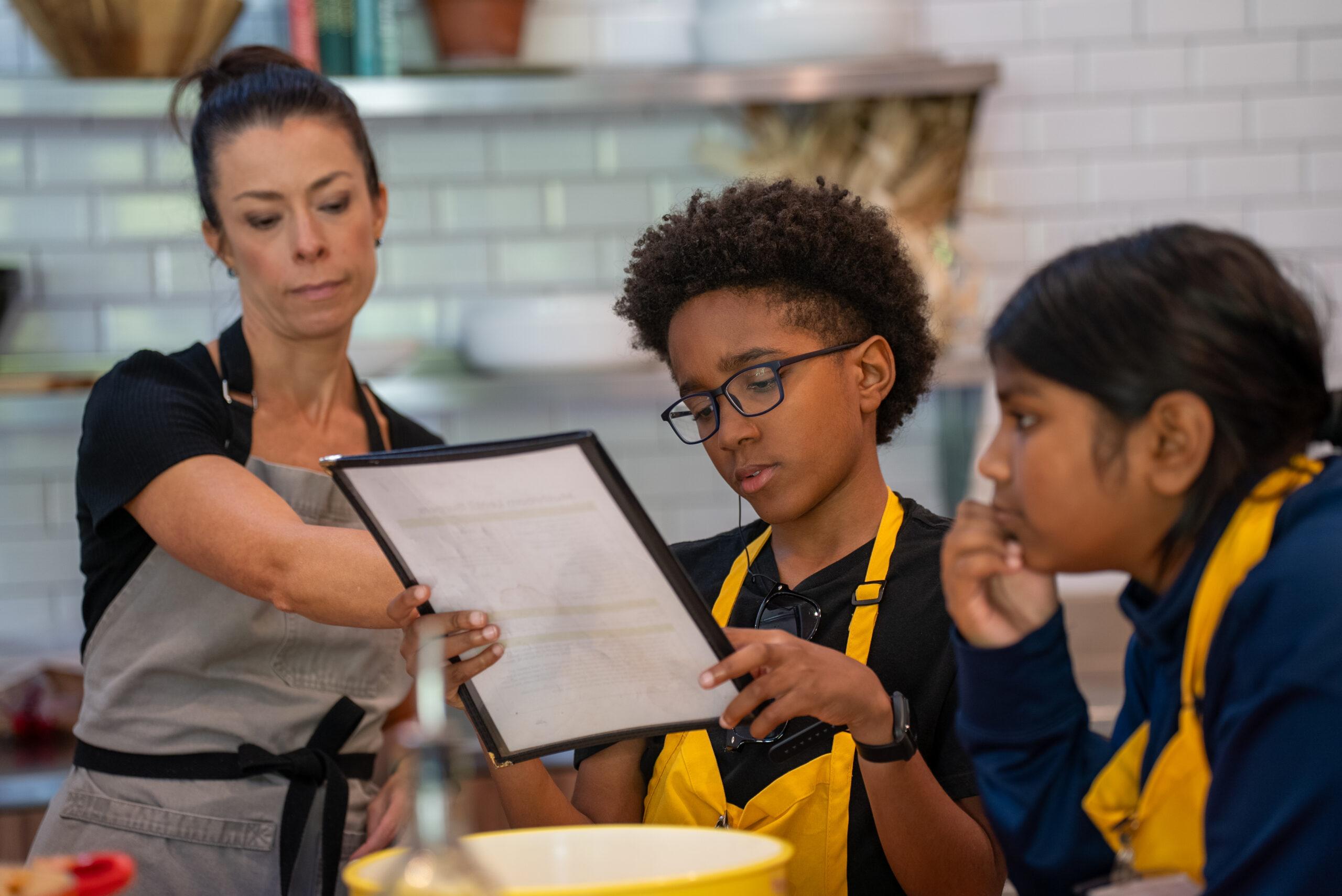 Students reading a recipe